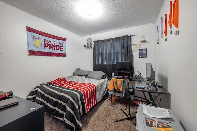 carpeted bedroom with a textured ceiling