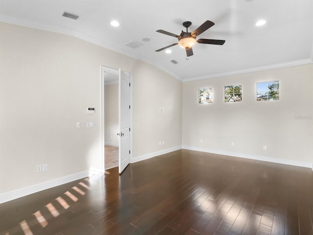 empty room featuring dark wood-type flooring, ornamental molding, and ceiling fan