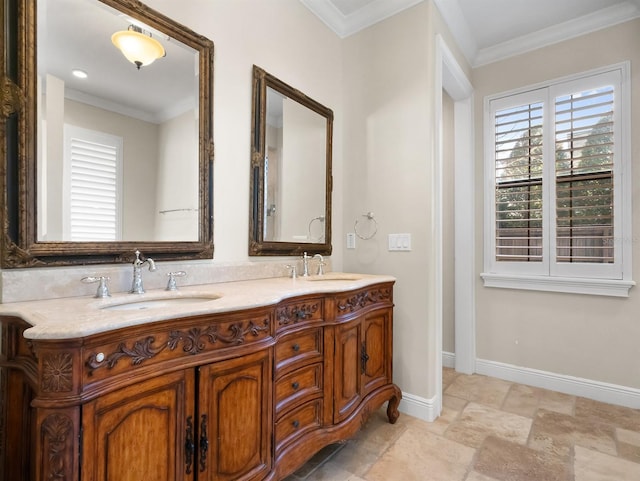 bathroom featuring crown molding and vanity