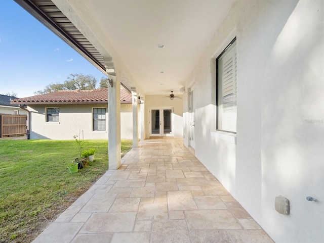 view of patio / terrace with french doors and ceiling fan