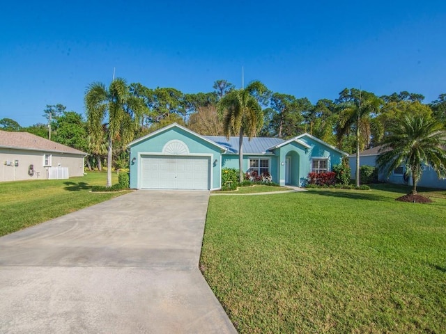 ranch-style home with a garage and a front yard