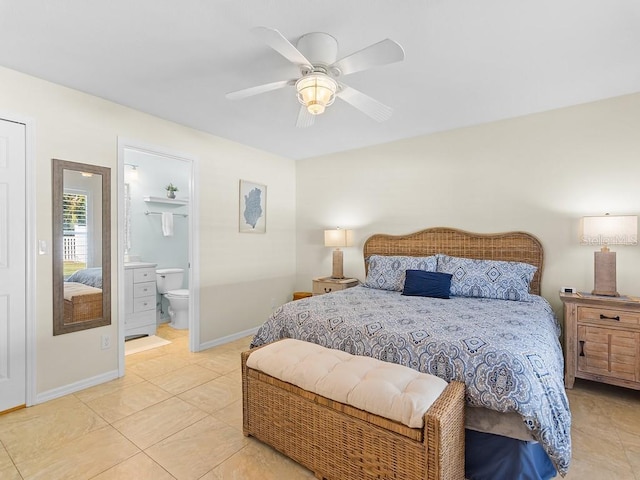 tiled bedroom featuring ceiling fan and ensuite bathroom