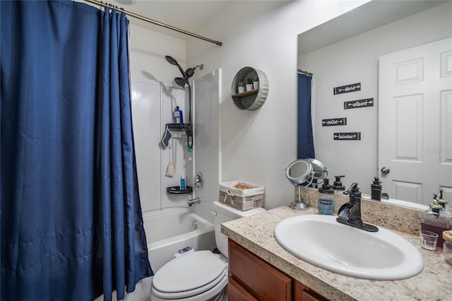 bathroom featuring toilet, shower / bath combination with curtain, and vanity