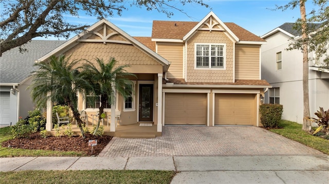 view of front of home with a garage