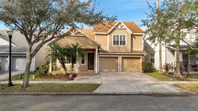 view of front of property with a garage