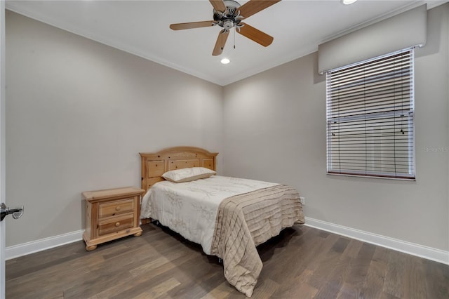 bedroom with ceiling fan, ornamental molding, and dark hardwood / wood-style flooring