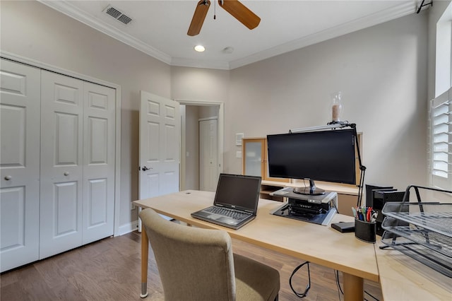 office space featuring hardwood / wood-style flooring, crown molding, and ceiling fan