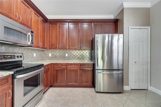 kitchen with light tile patterned floors, crown molding, backsplash, stainless steel appliances, and light stone counters