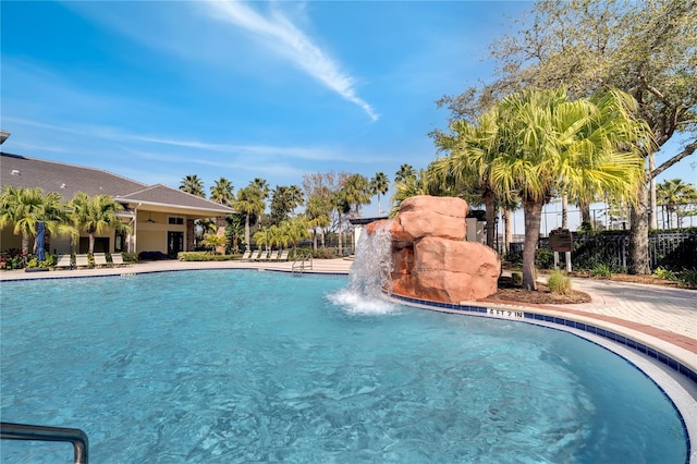 view of pool featuring pool water feature