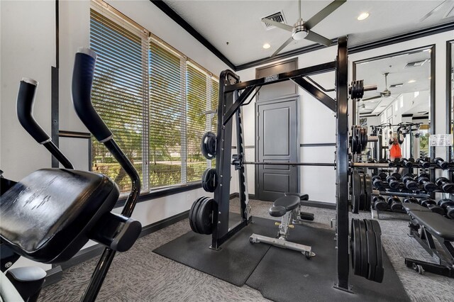 exercise room with ceiling fan