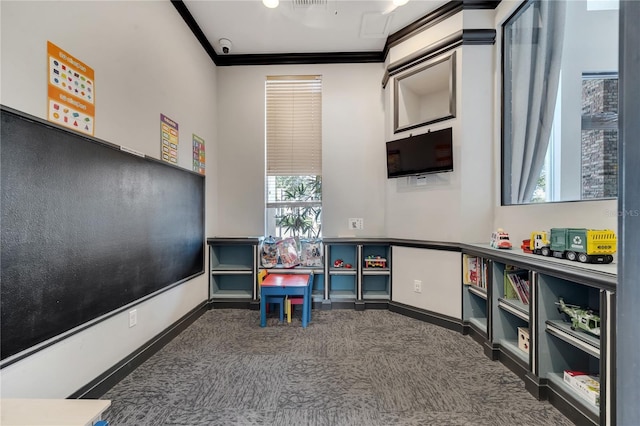 game room featuring crown molding and carpet flooring