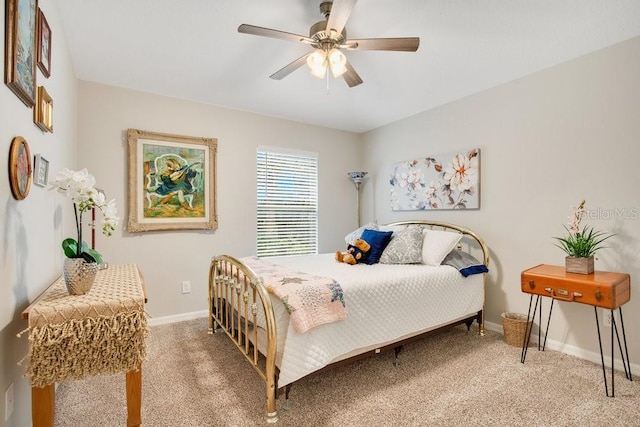 bedroom featuring ceiling fan and carpet floors