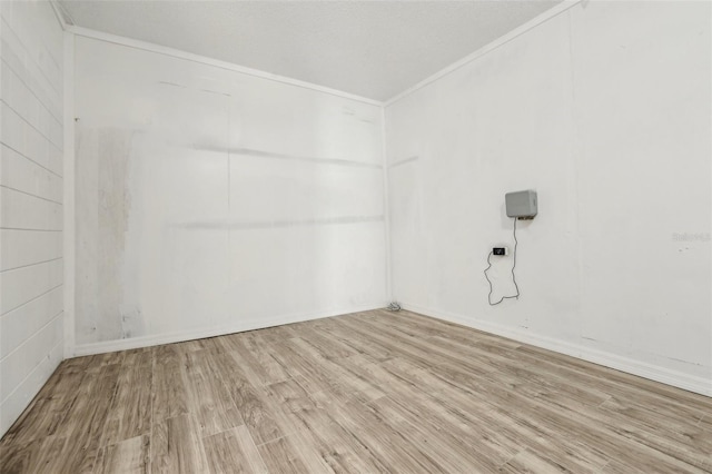 spare room with light wood-type flooring