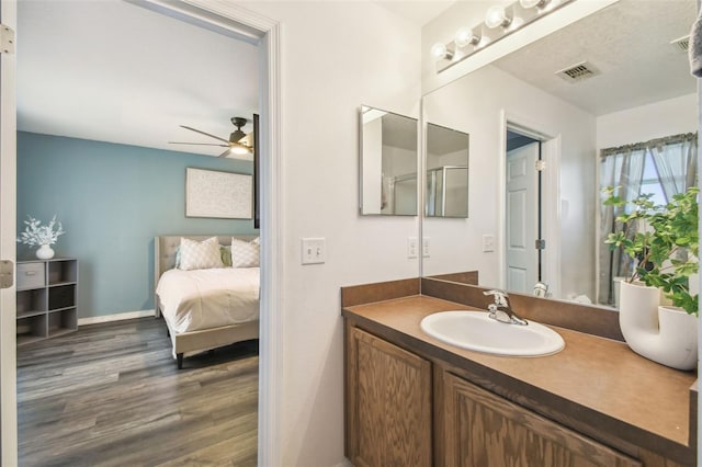 1821 Christina Lee Ln, Saint Cloud, FL 34769 - bathroom with ceiling fan, wood-type flooring, and vanity