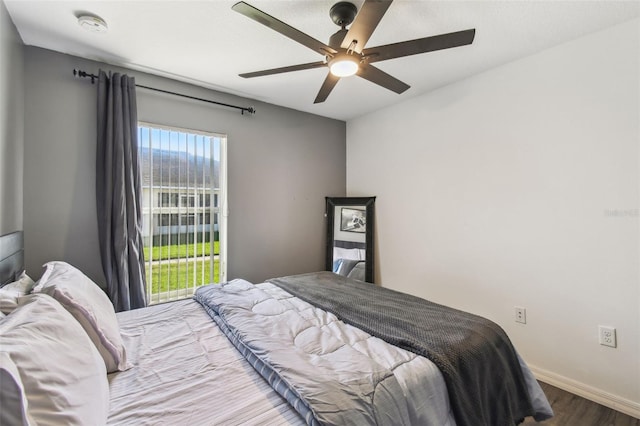 1821 Christina Lee Ln, Saint Cloud, FL 34769 - bedroom with ceiling fan, wood-type flooring, and access to outside