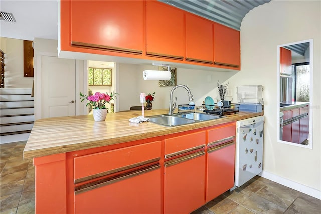 kitchen featuring dishwasher and sink