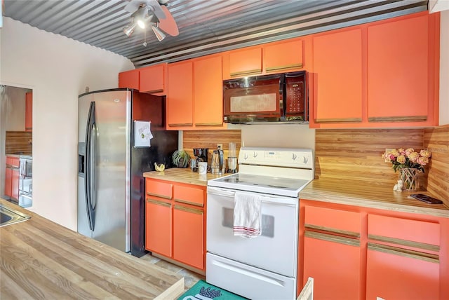 kitchen with ceiling fan, range, stainless steel fridge, and white range with electric stovetop