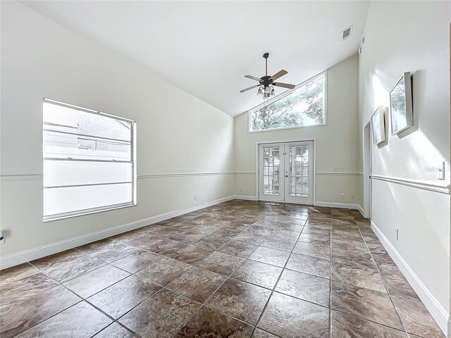 1970 Larkwood Dr, Apopka, FL 32703 - spare room with high vaulted ceiling, a ceiling fan, visible vents, french doors, and baseboards