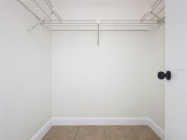 1970 Larkwood Dr, Apopka, FL 32703 - spacious closet with tile patterned flooring