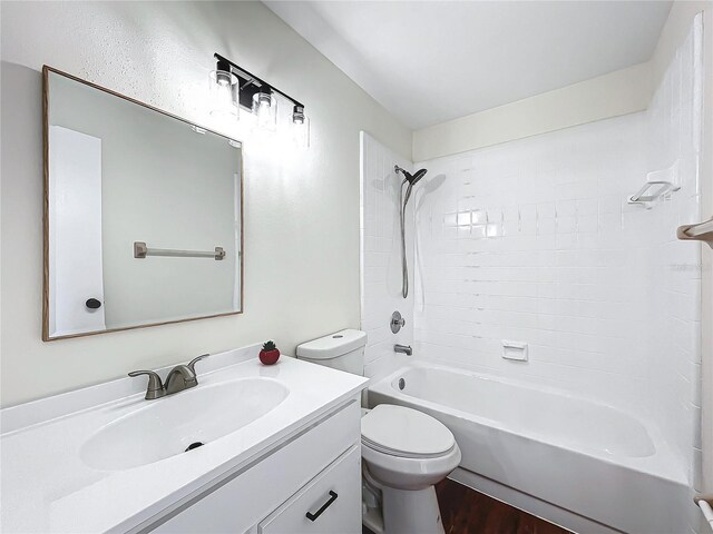 1970 Larkwood Dr, Apopka, FL 32703 - bathroom featuring toilet, bathing tub / shower combination, vanity, and wood finished floors
