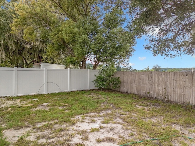 1970 Larkwood Dr, Apopka, FL 32703 - view of yard featuring a fenced backyard