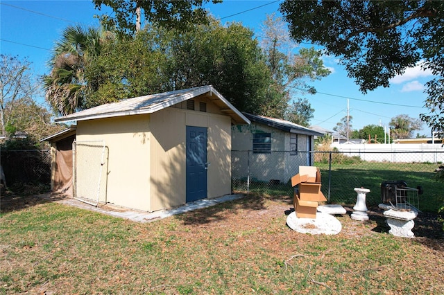 view of outdoor structure featuring a yard