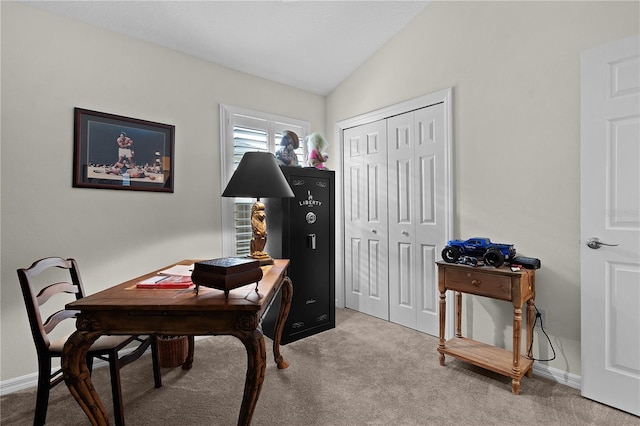 home office with light colored carpet and lofted ceiling