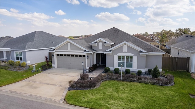 ranch-style home with a garage and a front lawn