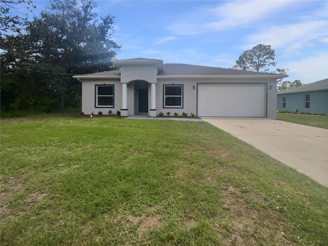 3328 Circleville St, North Port, FL 34286 - view of front of property featuring stucco siding, a garage, driveway, and a front lawn