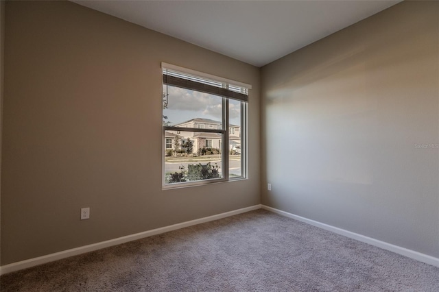 view of carpeted spare room