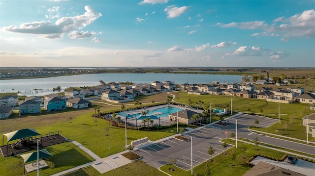 birds eye view of property featuring a water view