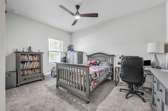 bedroom with ceiling fan and carpet