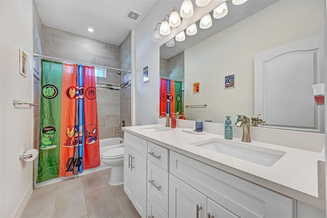 full bathroom featuring vanity, shower / bath combo, tile patterned floors, and toilet