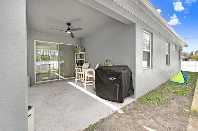 view of patio with ceiling fan and grilling area