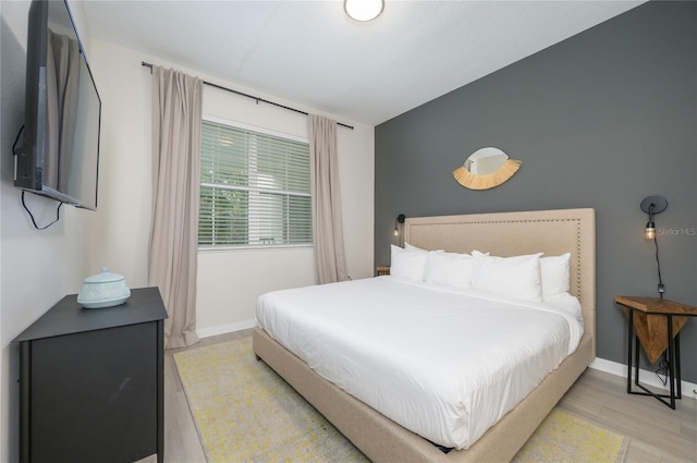 bedroom featuring light hardwood / wood-style floors