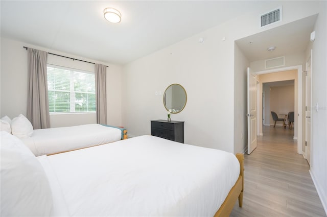 bedroom featuring light wood-type flooring