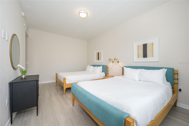 bedroom featuring hardwood / wood-style floors