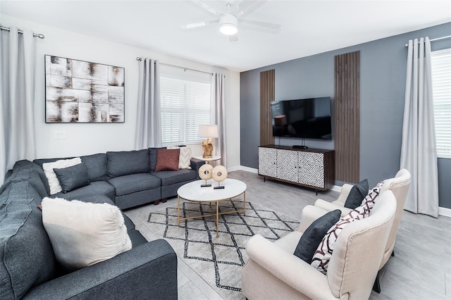 living room with ceiling fan