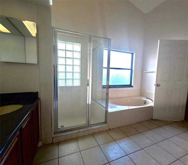 bathroom with vanity, shower with separate bathtub, and tile patterned floors