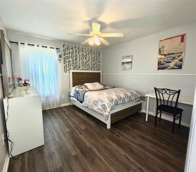 bedroom featuring dark hardwood / wood-style floors and ceiling fan