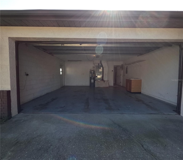 garage featuring water heater