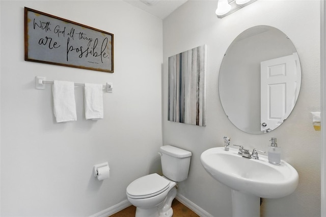 3270 Mt Vernon Way, Kissimmee, FL 34741 - bathroom with a sink, baseboards, and toilet