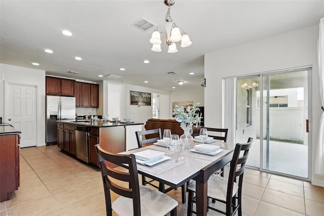 3270 Mt Vernon Way, Kissimmee, FL 34741 - dining room featuring a chandelier, visible vents, light tile patterned floors, and recessed lighting