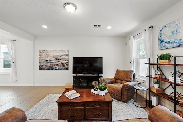 3270 Mt Vernon Way, Kissimmee, FL 34741 - living room with visible vents, baseboards, light tile patterned flooring, and recessed lighting