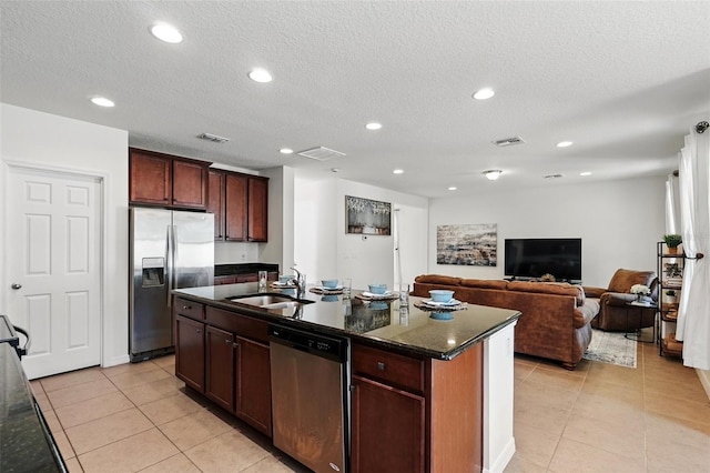 3270 Mt Vernon Way, Kissimmee, FL 34741 - kitchen with light tile patterned floors, visible vents, appliances with stainless steel finishes, and a sink