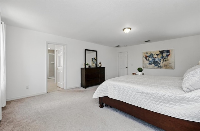 3270 Mt Vernon Way, Kissimmee, FL 34741 - bedroom featuring ensuite bath, light carpet, baseboards, and visible vents