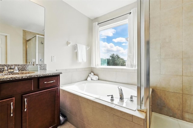 3270 Mt Vernon Way, Kissimmee, FL 34741 - bathroom with a shower stall, a garden tub, and vanity