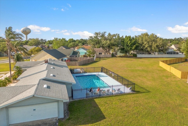 view of pool featuring a yard, a fenced in pool, a residential view, and fence