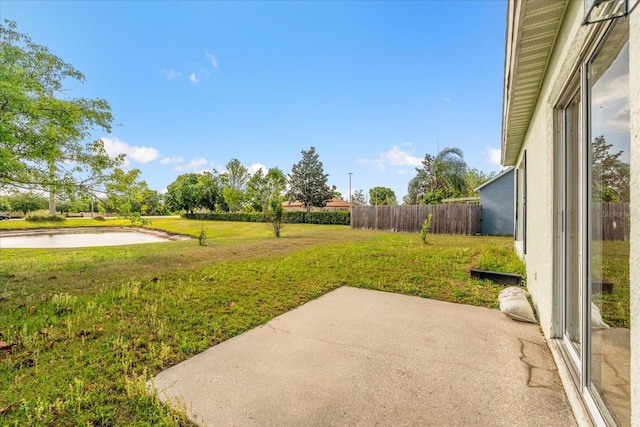 view of yard with a patio and fence