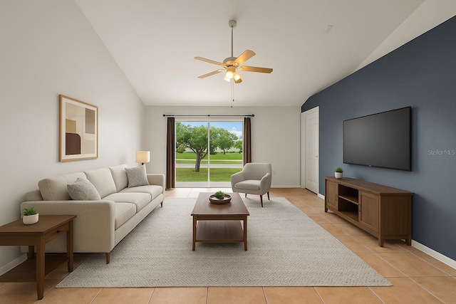 3304 Kelsey Ln, Saint Cloud, FL 34772 - living area featuring lofted ceiling, a ceiling fan, light tile patterned floors, and baseboards